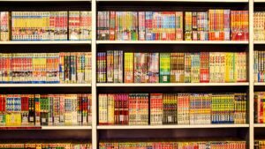 Vibrant shelves filled with Japanese manga in a bookstore. Perfect for comic enthusiasts.